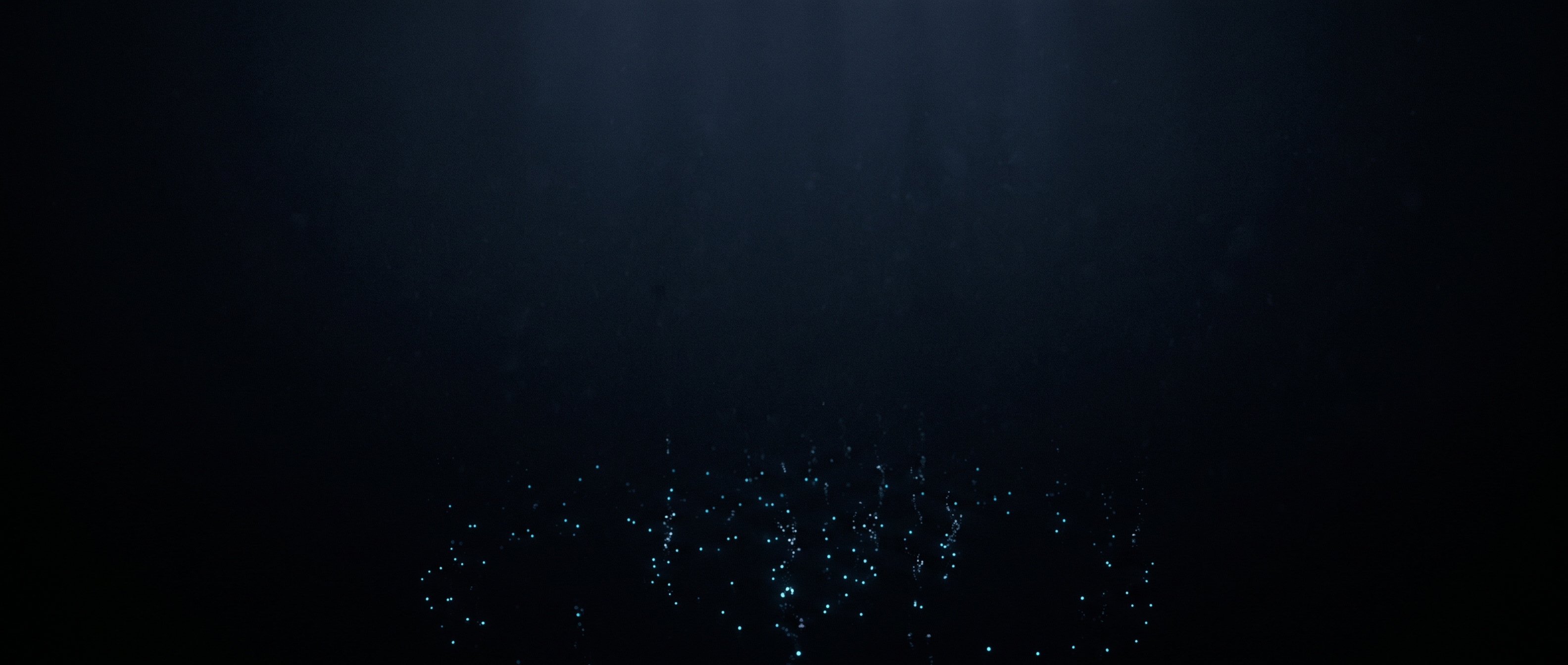 Dark water with faint light shafts and a cloud of cyan bioluminescent motes rising.